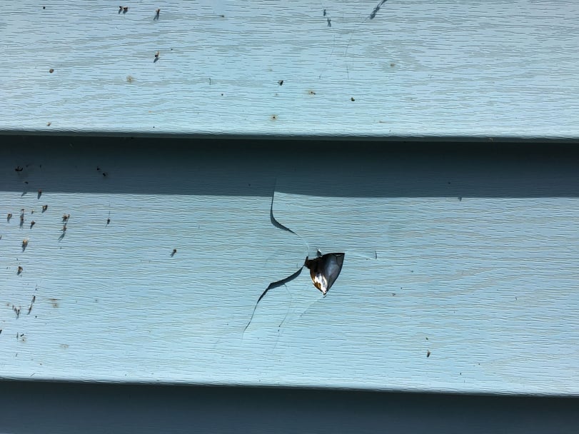 Damaged-vinyl-siding