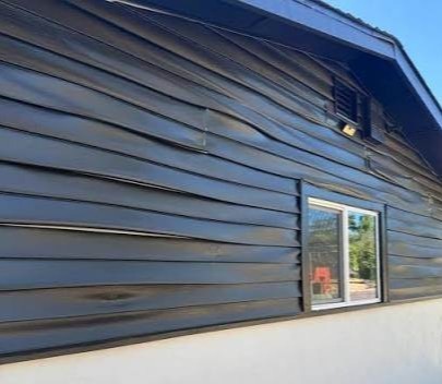 Warped-vinyl-siding