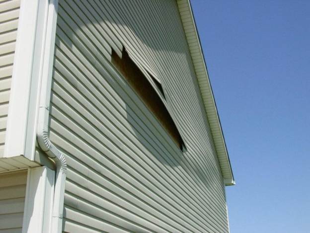 Loose-and-torn-off-siding